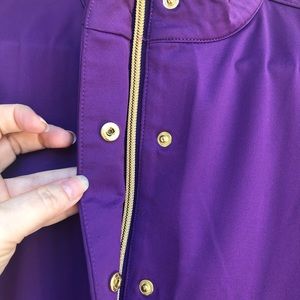 Stretchy classy zip up with gold zippered pockets